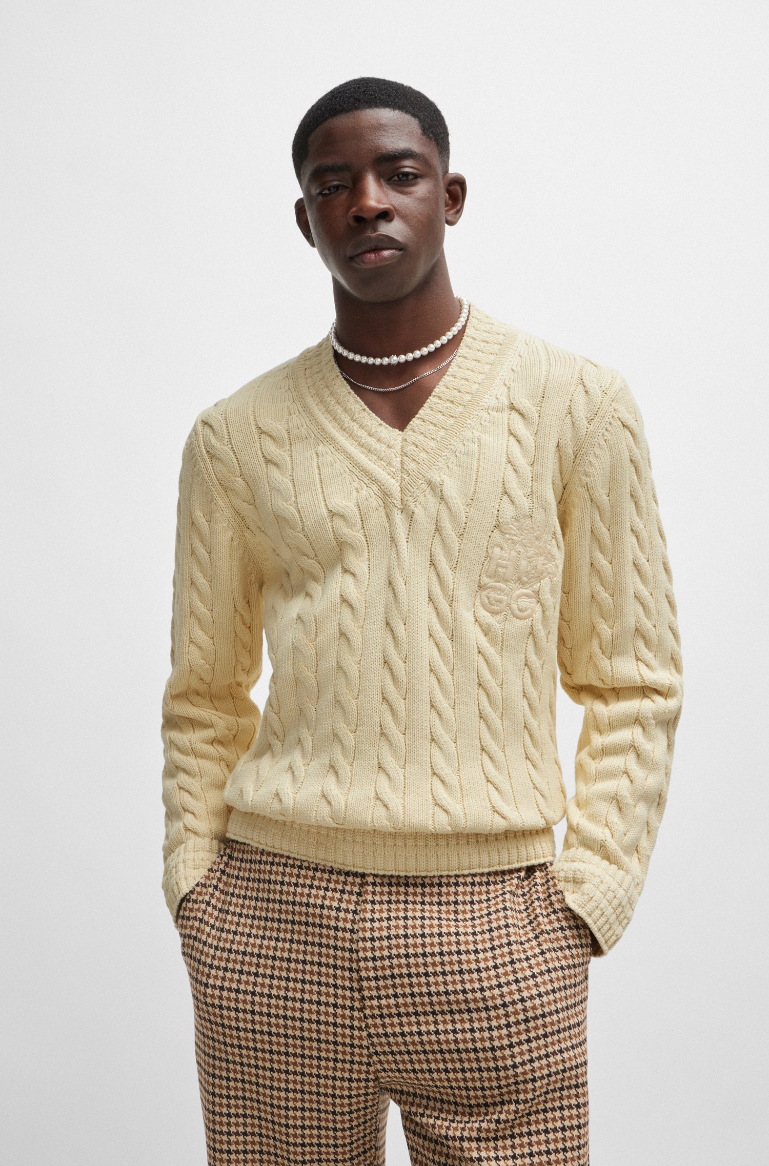 Cable-knit sweater with stacked logo