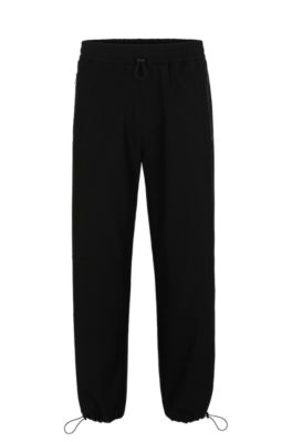 Hugo Boss Water-repellent Trousers With Adjustable Hems In Black