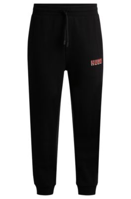 Hugo Boss Cotton-terry Tracksuit Bottoms With Logo Print In Black