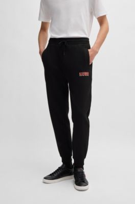 Cotton-terry tracksuit bottoms with logo print, Black