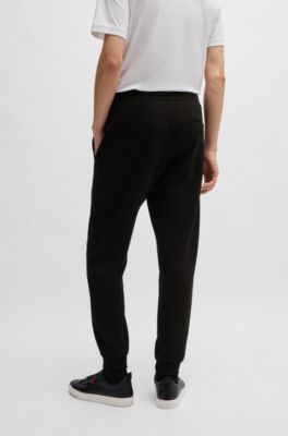 Cotton-terry tracksuit bottoms with logo print, Black