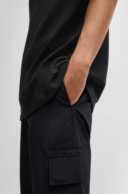 Oversize-fit all-gender T-shirt in cotton with logo label