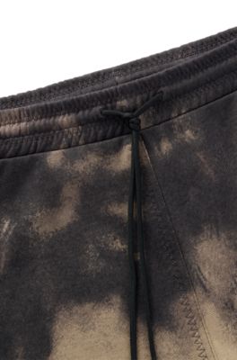 Cotton-terry relaxed-fit shorts with logo print, Brown