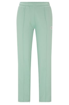 Shop Hugo Straight-fit Tracksuit Bottoms With Stacked Logo In Light Green