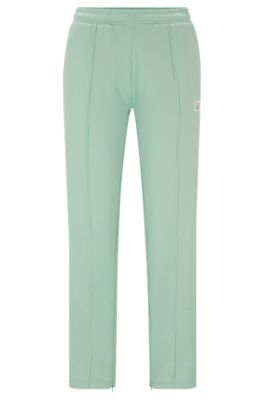 Straight-fit tracksuit bottoms with stacked logo, Light Green