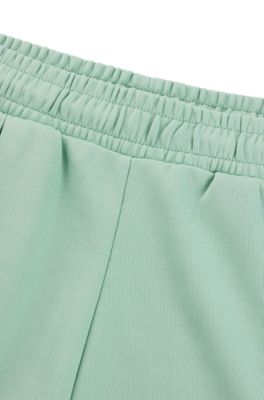 Straight-fit tracksuit bottoms with stacked logo, Light Green