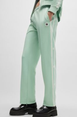 Straight-fit tracksuit bottoms with stacked logo, Light Green