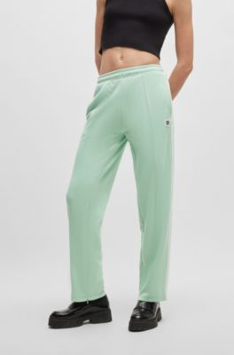 Straight-fit tracksuit bottoms with stacked logo, Light Green