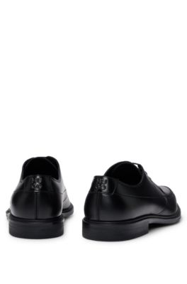 Leather Derby lace-up shoes with embossed branding, Black