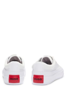 Low-top trainers with branded laces, White