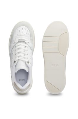 Leather trainers with suede trims and perforations
