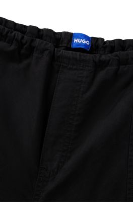 Oversize-fit parachute trousers in cotton poplin, Black