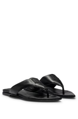 Leather thong sandals with stacked logo trim, Black
