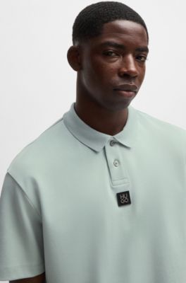 Polo de algod&oacute;n interlock con logo apilado, Cal