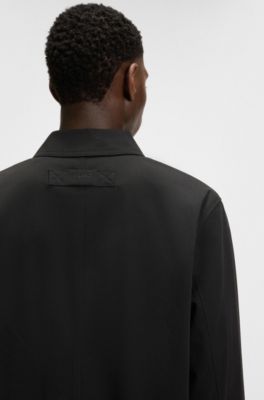 Manteau Regular en gabardine d&eacute;perlante, Noir