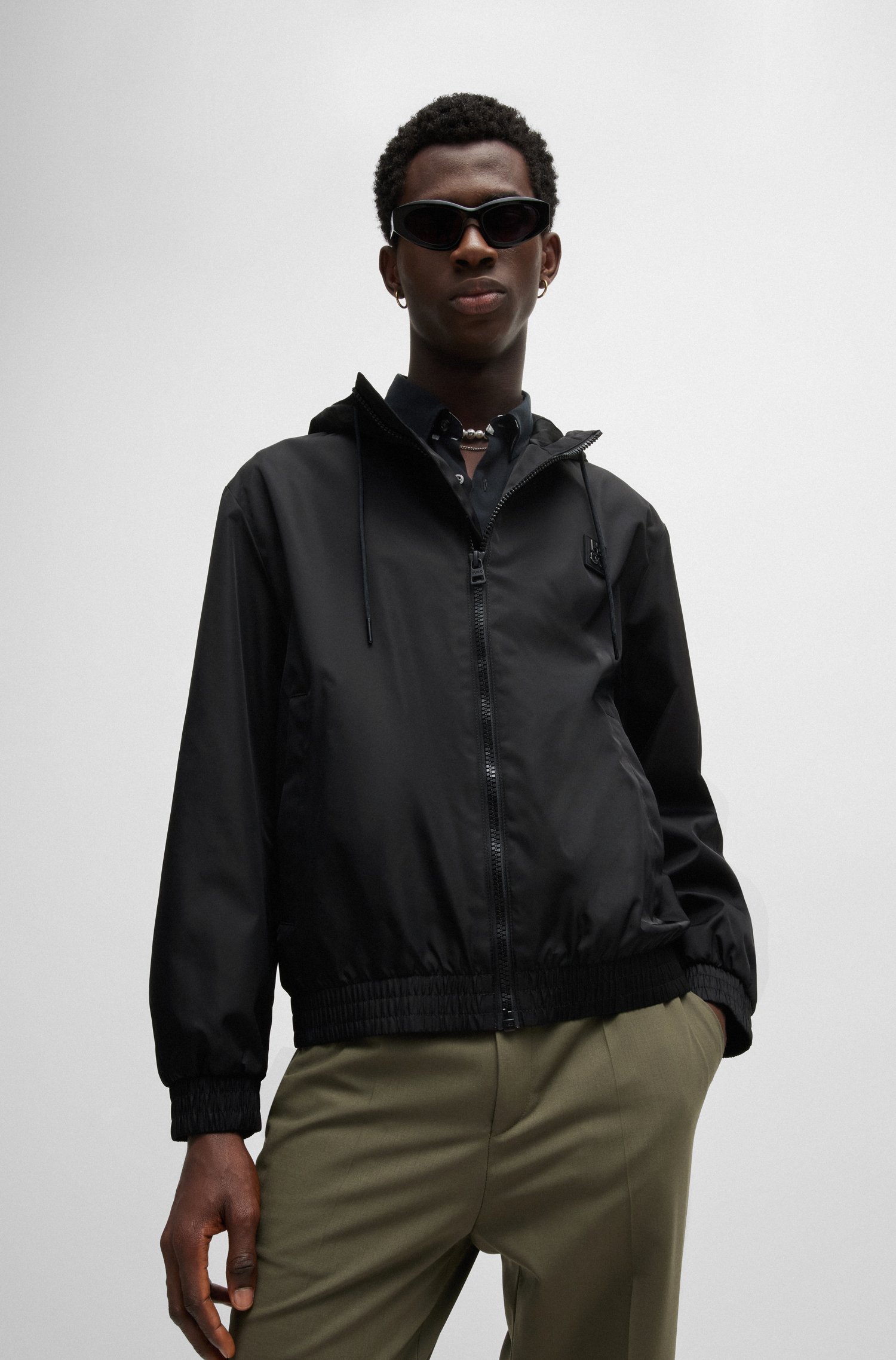 Water-repellent hooded jacket with stacked-logo trim