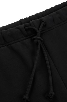 Relaxed-fit shorts with floral artwork, Black