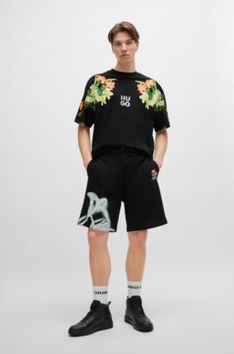 Relaxed-fit shorts with floral artwork, Black