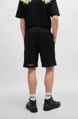 Relaxed-fit shorts with floral artwork, Black