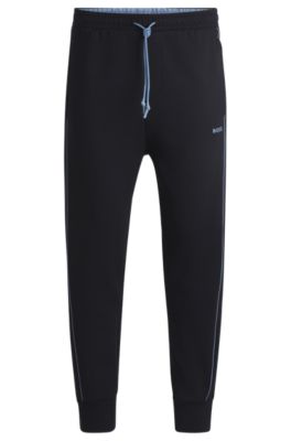Hugo Boss Stretch-cotton Tracksuit Bottoms With Embossed Artwork In Dark Blue