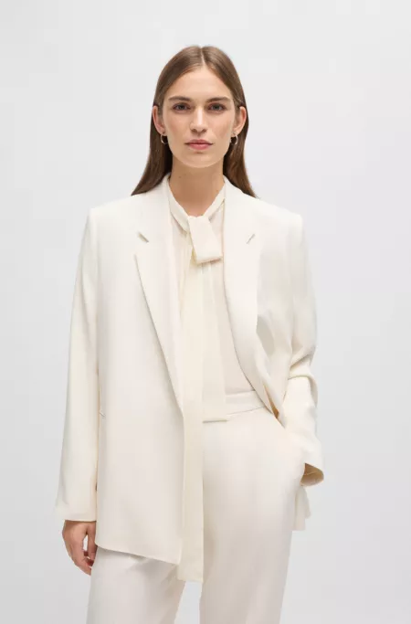 Relaxed-fit jacket with feature button