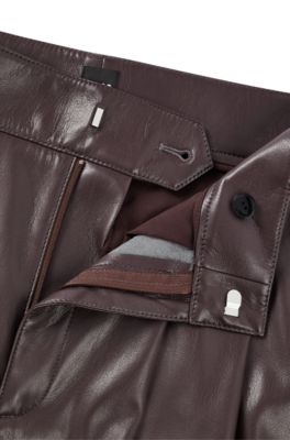 Pleat-front relaxed-fit trousers in faux leather, Light Red