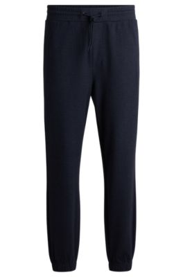 Hugo Boss Regular-fit Tracksuit Bottoms In Performance Fabric In Dark Blue