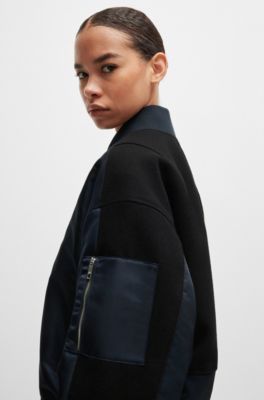 Chaqueta bomber repelente al agua con bolsillo de cremallera en la manga, Azul oscuro