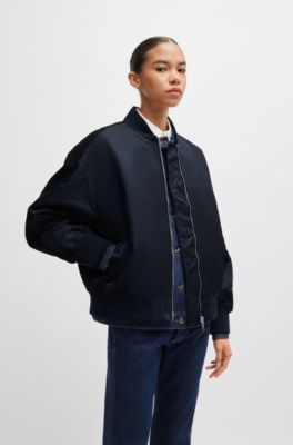 Water-repellent bomber jacket with zipped sleeve pocket