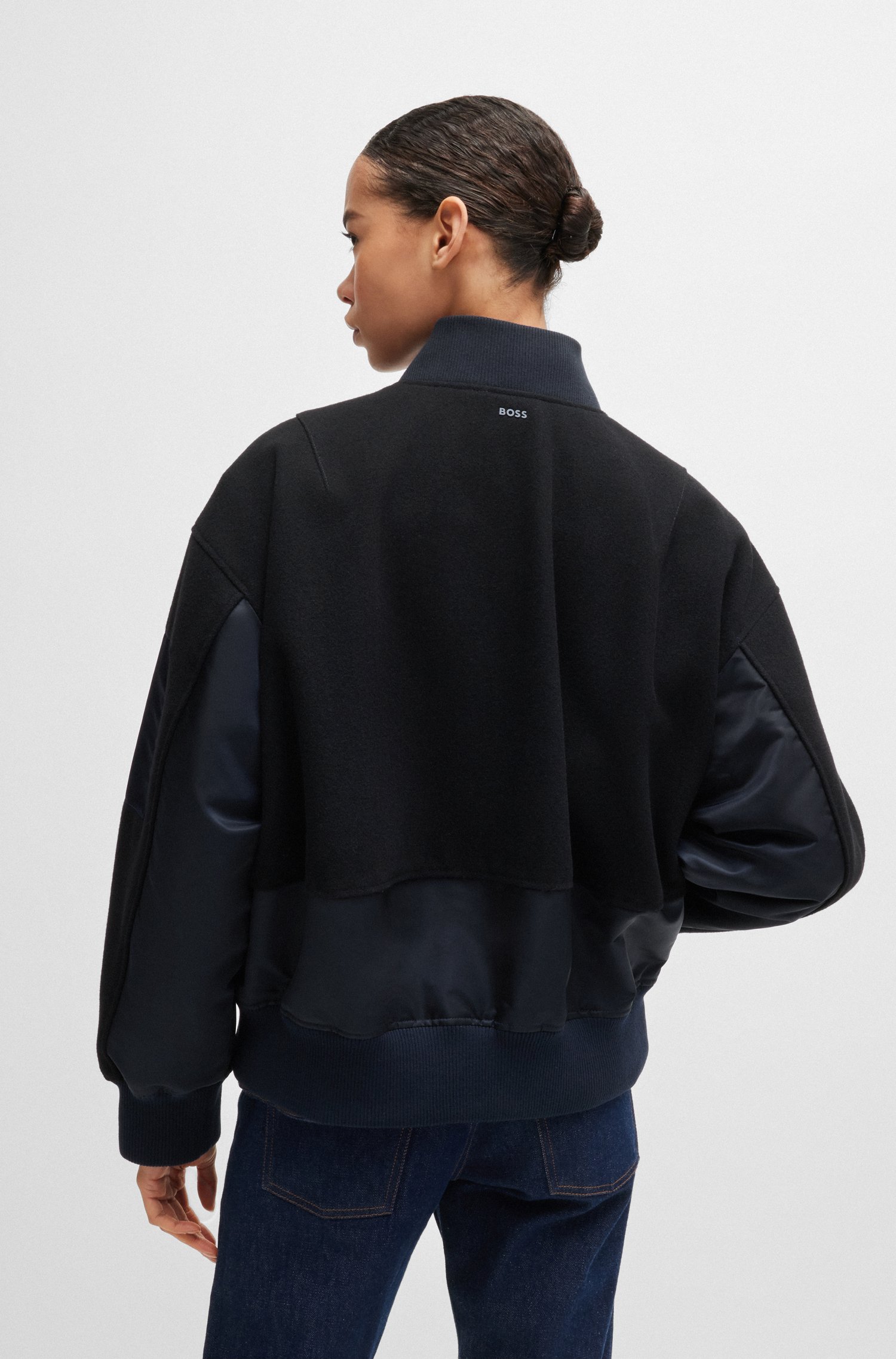 Water-repellent bomber jacket with zipped sleeve pocket