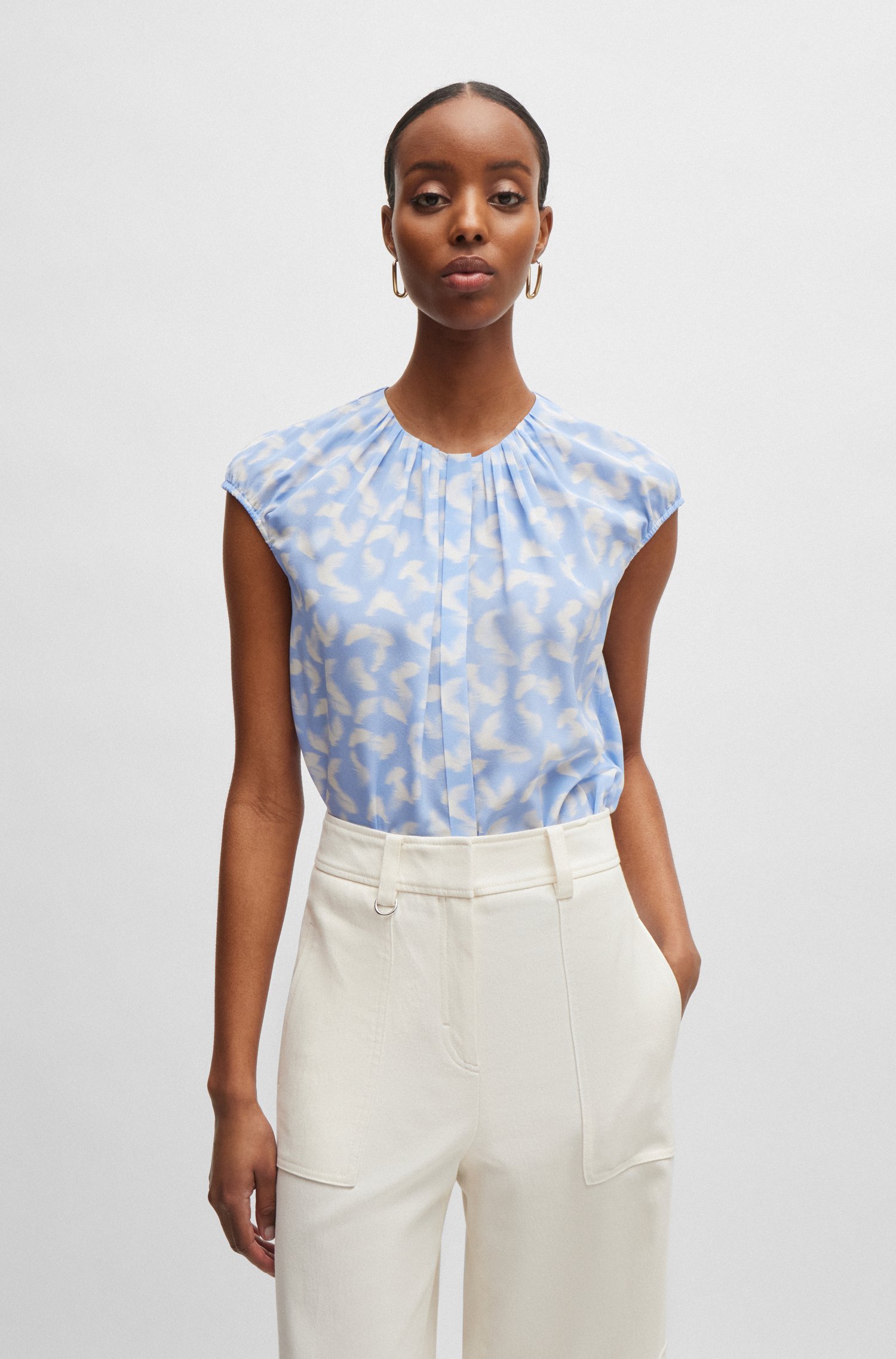 Collarless cap-sleeve blouse printed silk