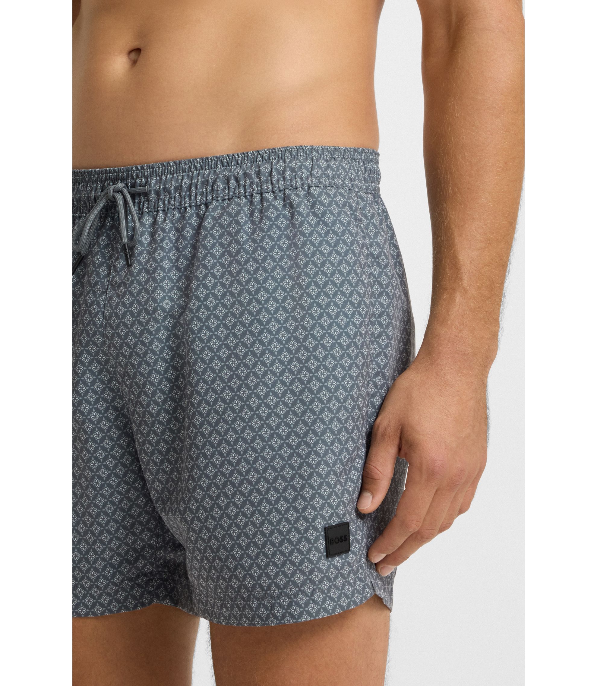 BOSS - Printed swim shorts with logo badge - Dark Grey