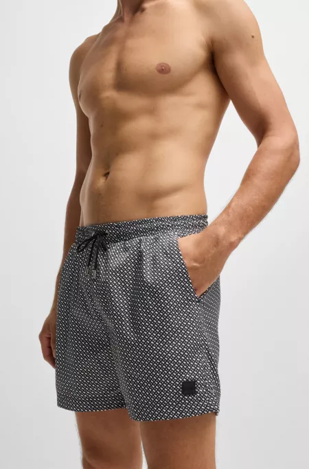 Monogram-print swim shorts in quick-dry fabric