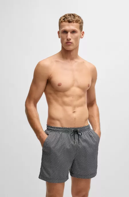 Monogram-print swim shorts in quick-dry fabric