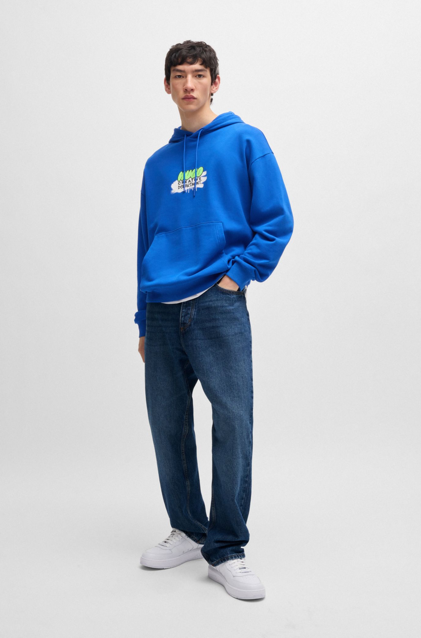 HUGO - Baggy-fit jeans in blue denim - Blue