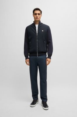 Mixed-material zip-up jacket with double-monogram badge