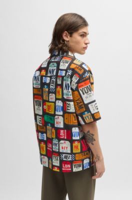 Camisa oversize fit de popel&iacute;n de algod&oacute;n con logo estampado de temporada, Rosa claro