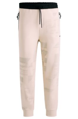 Tracksuit bottoms with seasonal artwork, White