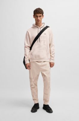 Tracksuit bottoms with seasonal artwork, White