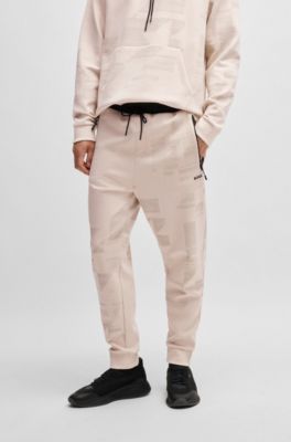 Tracksuit bottoms with seasonal artwork, White