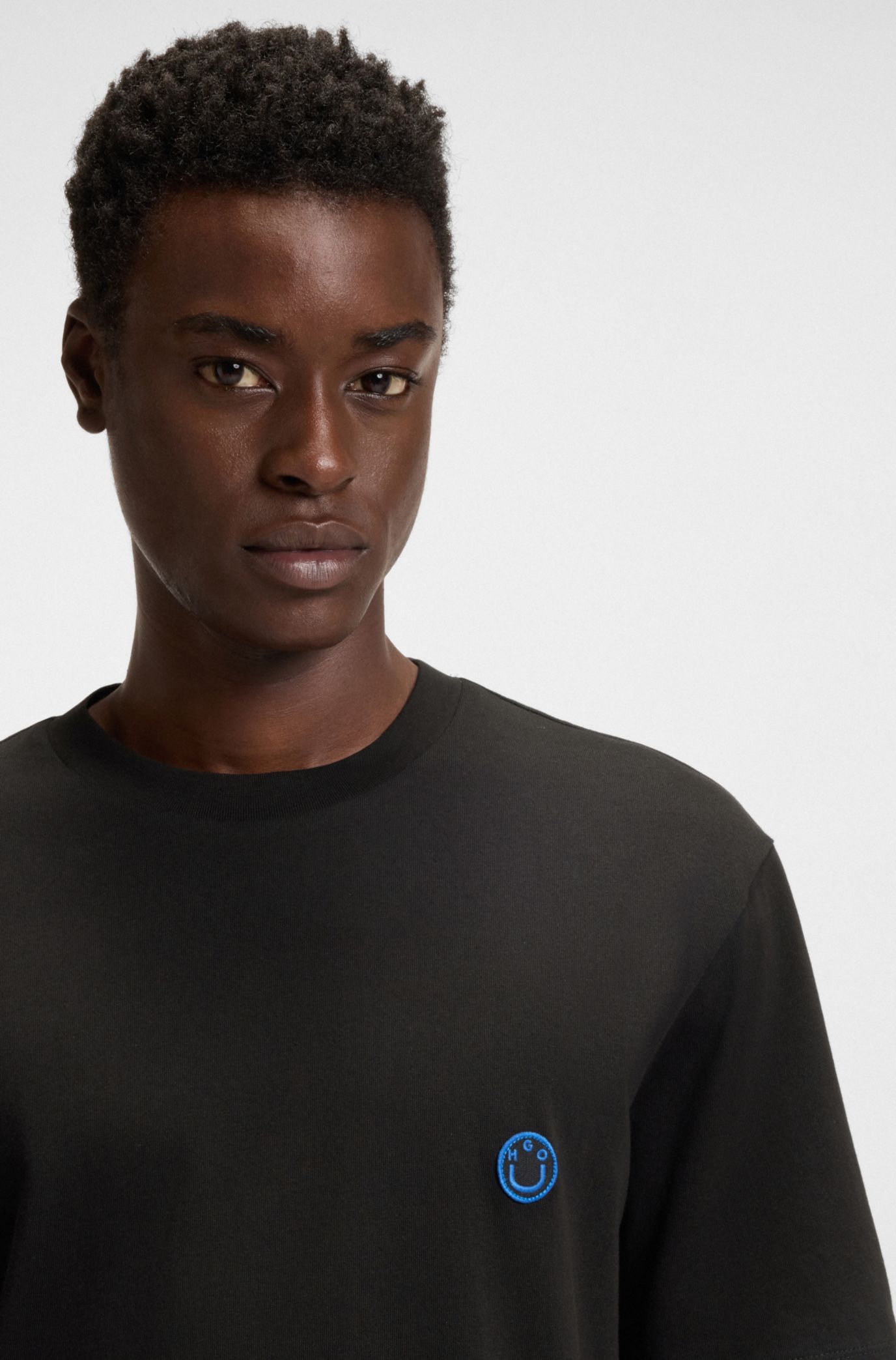 HUGO - Cotton jersey T-shirt with curved logo - Black