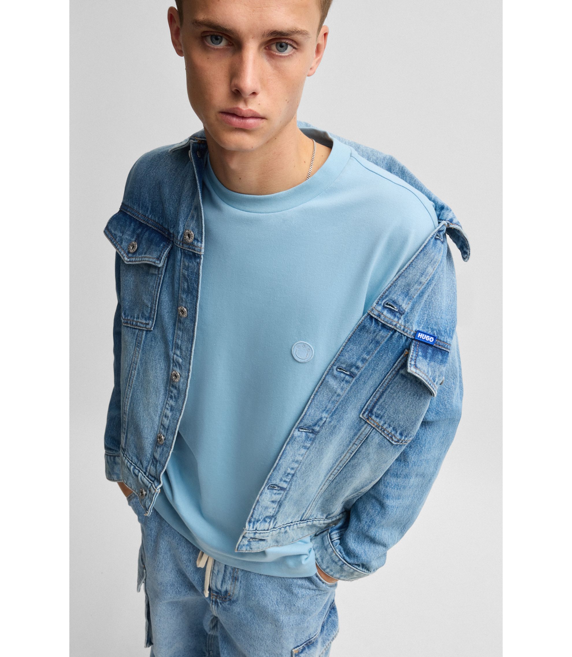 HUGO - Cotton-jersey T-shirt with Happy HUGO logo - Light Blue