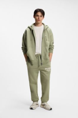 Sudadera de felpa de algod&oacute;n con capucha y logos estampados, Desbordamiento de color beige