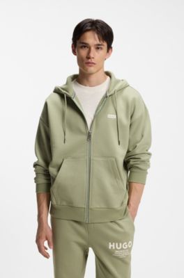 Sudadera de felpa de algod&oacute;n con capucha y logos estampados, Desbordamiento de color beige