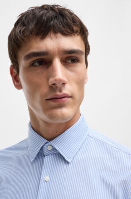Camisa regular fit en material t&eacute;cnico a rayas, Celeste