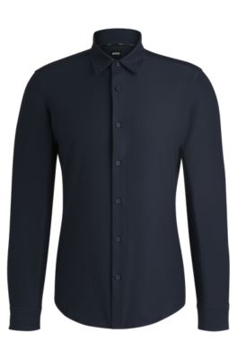 Camisa slim fit en tejido t&eacute;cnico el&aacute;stico de espiga, Azul oscuro