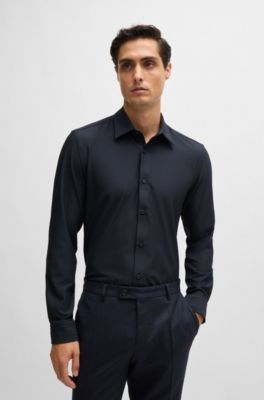 Camisa slim fit en tejido t&eacute;cnico el&aacute;stico de espiga, Azul oscuro
