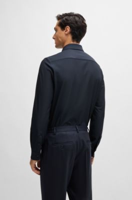 Camisa slim fit en tejido t&eacute;cnico el&aacute;stico de espiga, Azul oscuro