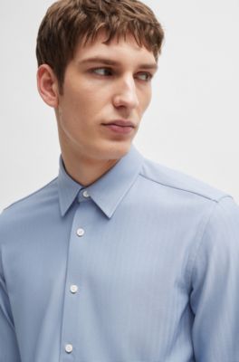 Camisa slim fit en tejido t&eacute;cnico el&aacute;stico de espiga, Celeste