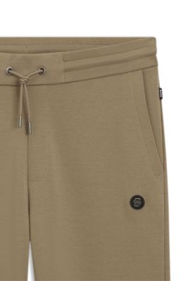 Pantalones de ch&aacute;ndal de algod&oacute;n con monograma Double&nbsp;B metalizado, Marr&oacute;n claro